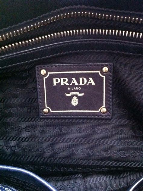 do prada bags have serial numbers inside|Prada bag authentication guide.